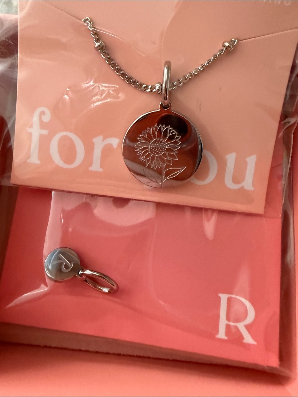 Silver Sunflower Pendant Necklace - For You Collection with letter R initial.
